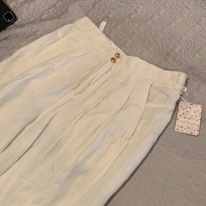 Free people, ivory pants. Wide leg. Hundred percent linen, detail buckles, sz 2
